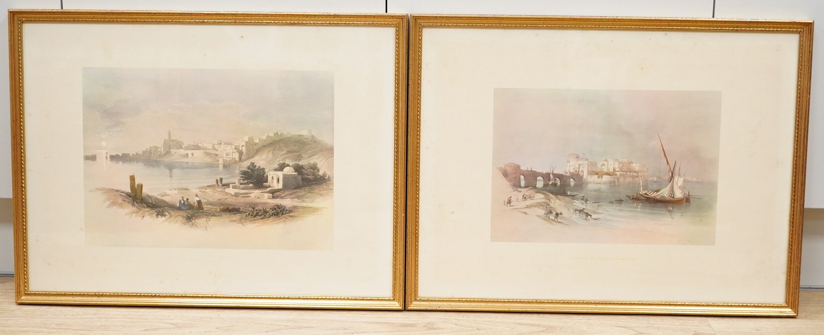 After David Roberts RA RBA (Scottish 1796-1864) - a pair of reproduction colour prints, Citadel of Sidon, Lebanon and Sidon, 42 x 56cm, gilt framed. Condition - fair, would benefit from a clean